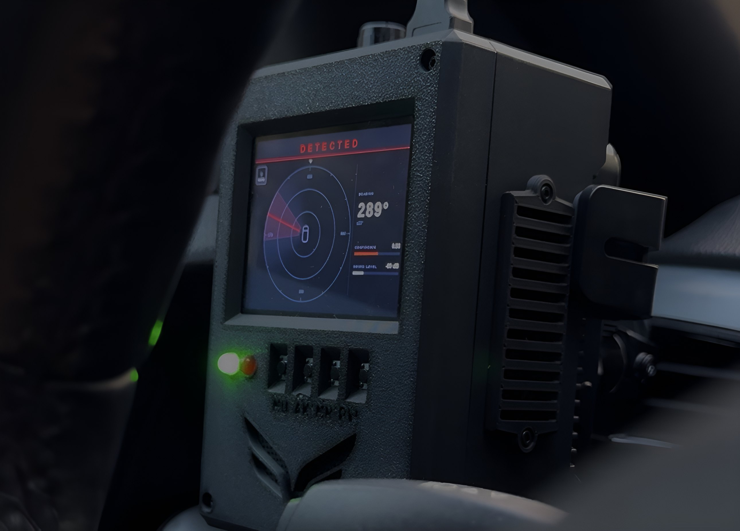 The Greywing display unit mounted in a vehicle, its screen showing a detection at a bearing of 289 degrees